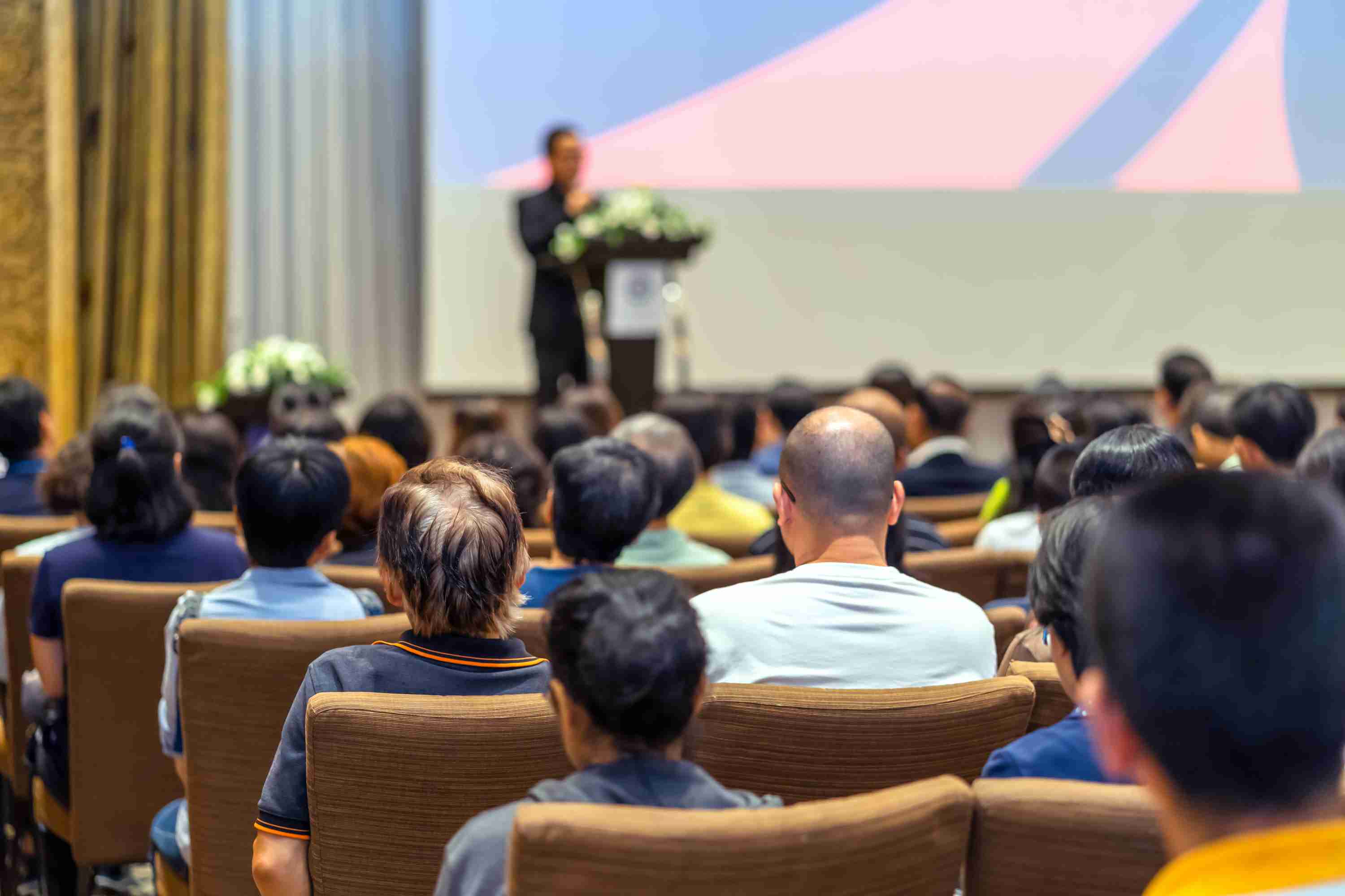 shot from the back of a live corporate event